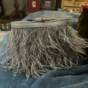 Brand new with tags Anthropologie blue grey purse with feathers